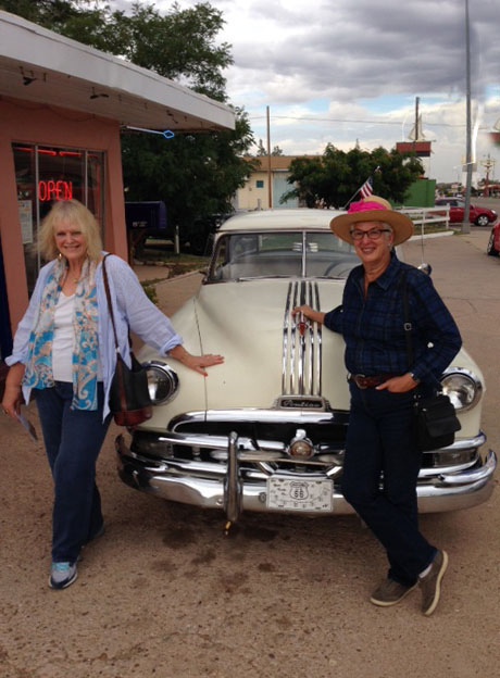 Carol and Donna with vintage automobile