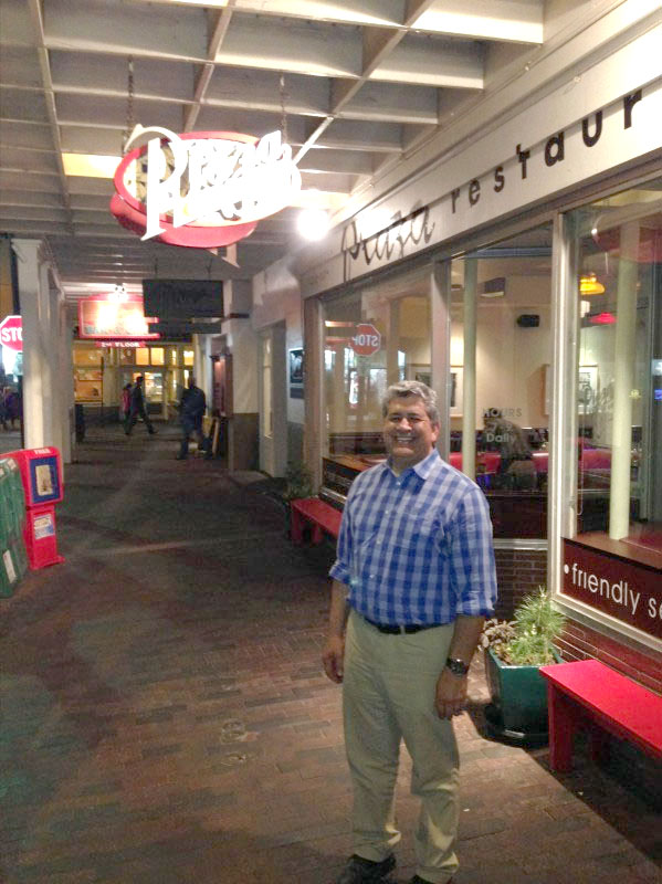 Daniel outside the Plaza Café