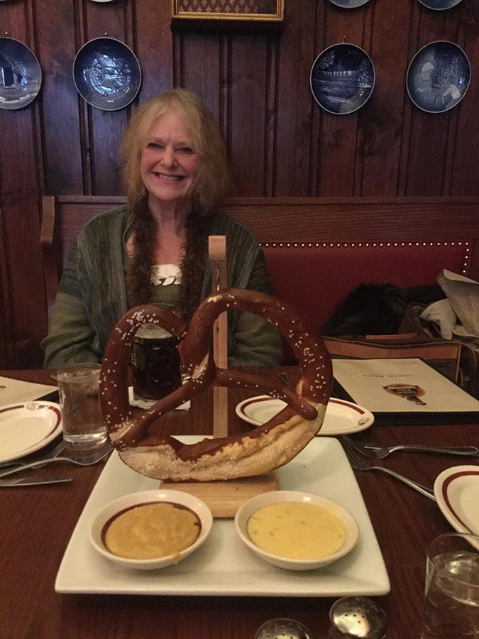 Carol enjoying a giant pretzel