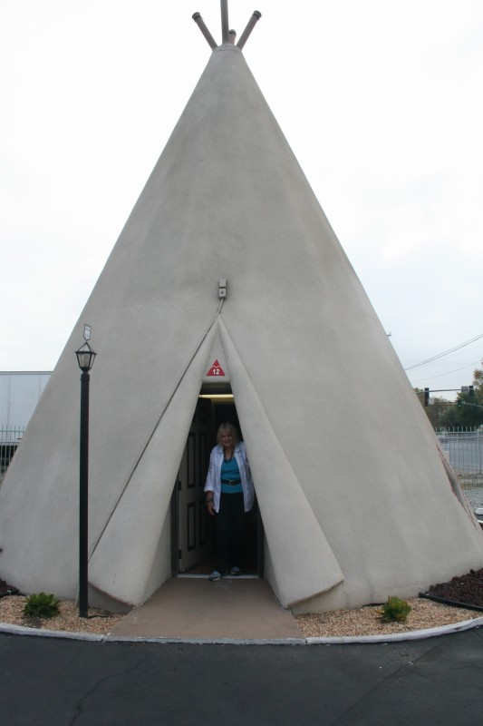 Carol at the entrance of the Wigwam Motel